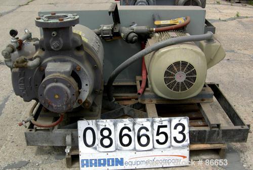Used Nash Liquid Ring Vacuum Pump, Model SC7, Cast Iron Construction. Approximate capacity 700 CFM at 880 RPM. Driven by a 75 HP, 3/60/230/460 Volt, 1765 RPM motor. 6" inlet/outlet. Includes muffler....