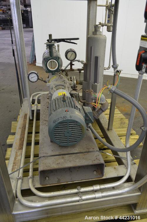 Used Nash Two Stage Liquid Ring Vacuum Pump, Model XL35/5, Carbon Steel. Approximate 100 CFM. Driven by a 10hp, 3/60/460 volt, 1755 rpm motor. Includes a tank. Base mounted.