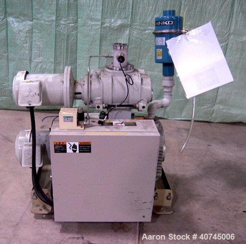 Used Shinko Seiki Oil Sealed Rotary Vacuum Pump, Model SGD-600, carbon steel. Approximate 24 cfm. Driven by a 1.5KW (2 hp), 4 pole, 200/220 volt, 1710/1720 rpm motor. Includes a Roots blower/booster,...