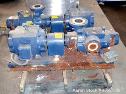 Used Nash Liquid Ring Compressor, Model SC2/7, carbon steel. Rated up to 200 cfm and 28" of vacuum. 3" inlet, 2" outlet. Driven by a 15 hp, 3/60/230/460 volt motor. Base mounted.