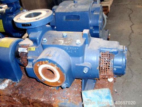 Used Nash Liquid Ring Compressor, Model SC2/7, carbon steel. Rated up to 200 cfm and 28" of vacuum. 3" inlet, 2" outlet. Driven by a 15 hp, 3/60/230/460 volt motor. Base mounted.