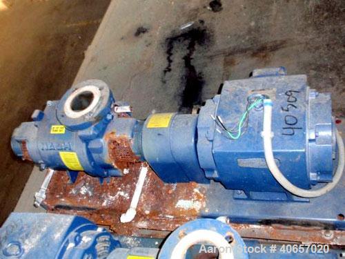 Used Nash Liquid Ring Compressor, Model SC2/7, carbon steel. Rated up to 200 cfm and 28" of vacuum. 3" inlet, 2" outlet. Driven by a 15 hp, 3/60/230/460 volt motor. Base mounted.