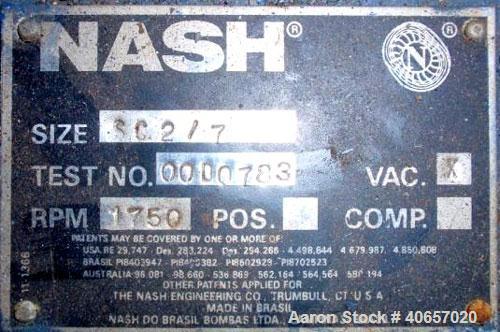Used Nash Liquid Ring Compressor, Model SC2/7, carbon steel. Rated up to 200 cfm and 28" of vacuum. 3" inlet, 2" outlet. Driven by a 15 hp, 3/60/230/460 volt motor. Base mounted.