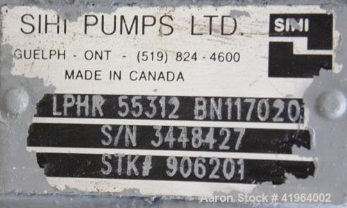 Used Sihi Liquid Ring Vacuum Pump, Model LPHR-55312, Carbon Steel. 2" inlet/outlet. Approximately 185 cfm at 20" HG. Driven by a 15 hp, 3/60/230/460 volt, 1760 rpm motor. Base mounted with a tank.