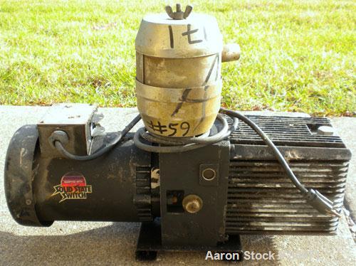 Used Sargent-Welch DirecTorr Vacuum Pump, Model 8821A, Rated 7 CFM. Driven by a 1/2 HP, 1/60/115/208-230 Volt, 1725 RPM motor. Includes a top mounted filter.