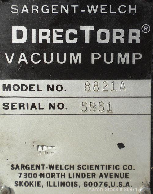 Used Sargent-Welch DirecTorr Vacuum Pump, Model 8821A, Rated 7 CFM. Driven by a 1/2 HP, 1/60/115/208-230 Volt, 1725 RPM motor. Includes a top mounted filter.