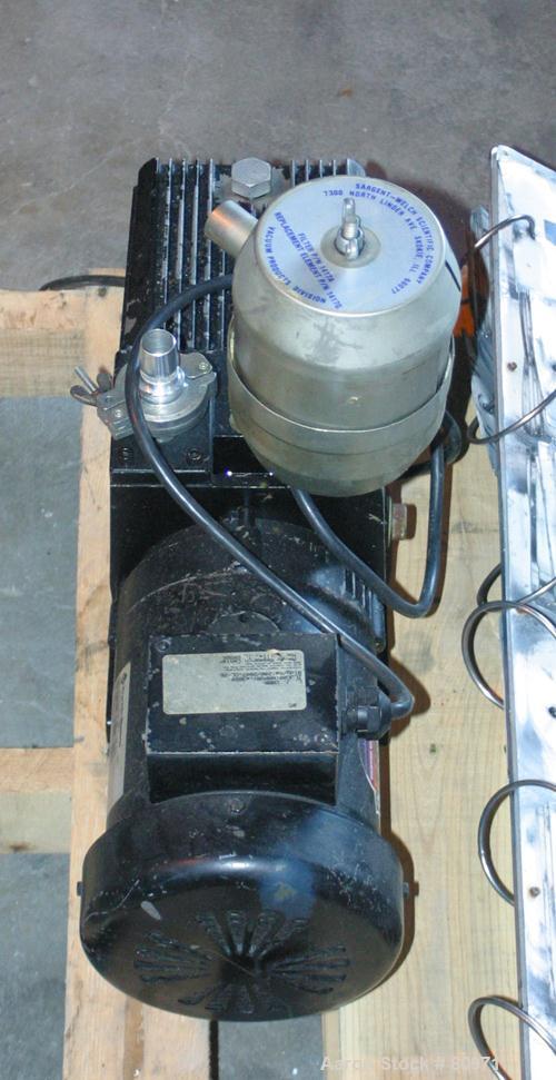 Used Sargent-Welch DirecTorr Vacuum Pump, Model 8821A, Rated 7 CFM. Driven by a 1/2 HP, 1/60/115/208-230 Volt, 1725 RPM motor. Includes a top mounted filter.