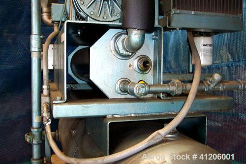 Used Squire Cogswell Rotary Vane Vacuum Pump, Approximate capacity 60 CFM, Carbon Steel. Serial #AAF09019CQ. Driven by a 3 hp, 3/60/208-230/460 volt, 1160 rpm motor. Includes a Thermal Transfer Produ...
