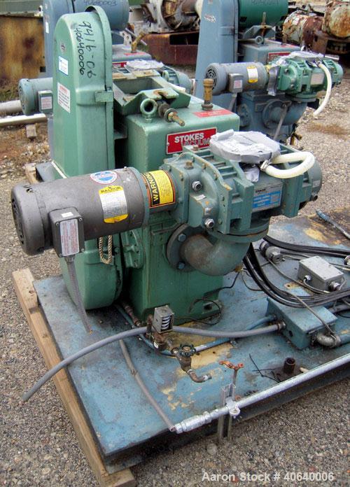 Used Stokes Microvac Rotary Piston Vacuum Pump, model 212-11, carbon steel. Approximately 150 cfm. 3" inlet, 2" outlet. Requires an approximate 7 1/2 motor. Includes a Stokes blower/booster, model 30...