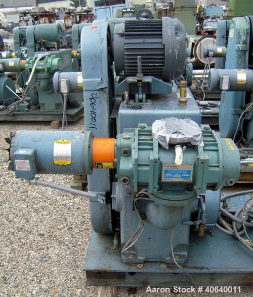 Used Stokes Microvac Rotary Piston Vacuum Pump, model 212-11, carbon steel. Approximately 150 cfm. 3'' inlet, 2'' outlet. Driven by a 7 1/2 hp, 3/60/208-230/460 volt, 1760 rpm motor. Includes a Stoke...