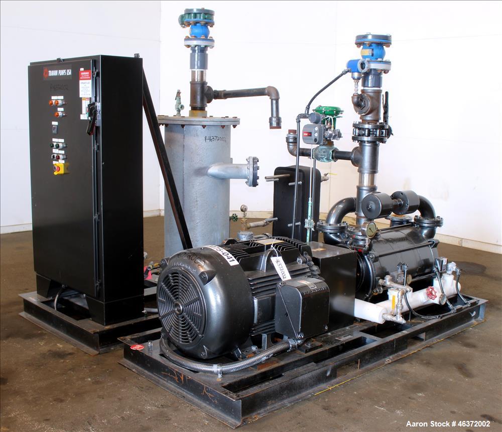Used Travaini Vacuum System, Model TRW1000H-FR, Carbon Steel. Consisting of Travaini vacuum pump, model TRHE100-1600/X-C/F, serial #AN214-FDPKG, approximately 1000 CFM, 4" inlet/outlet, driven by 100...