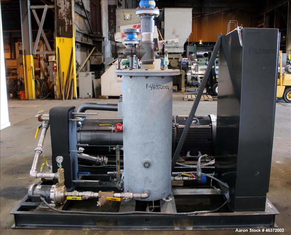 Used Travaini Vacuum System, Model TRW1000H-FR, Carbon Steel. Consisting of Travaini vacuum pump, model TRHE100-1600/X-C/F, serial #AN214-FDPKG, approximately 1000 CFM, 4" inlet/outlet, driven by 100...