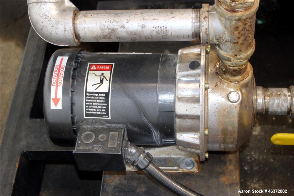 Used Travaini Vacuum System, Model TRW1000H-FR, Carbon Steel. Consisting of Travaini vacuum pump, model TRHE100-1600/X-C/F, serial #AN214-FDPKG, approximately 1000 CFM, 4" inlet/outlet, driven by 100...