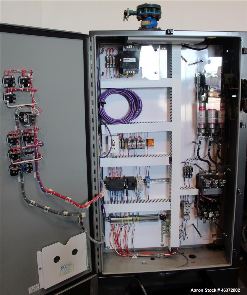 Used Travaini Vacuum System, Model TRW1000H-FR, Carbon Steel. Consisting of Travaini vacuum pump, model TRHE100-1600/X-C/F, serial #AN214-FDPKG, approximately 1000 CFM, 4" inlet/outlet, driven by 100...