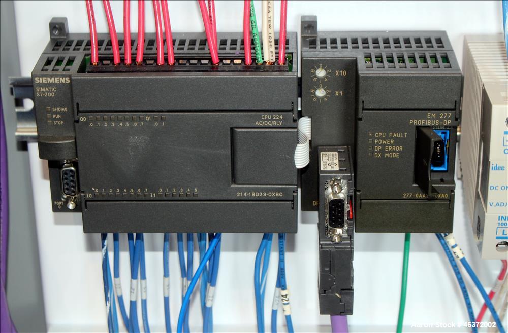 Used Travaini Vacuum System, Model TRW1000H-FR, Carbon Steel. Consisting of Travaini vacuum pump, model TRHE100-1600/X-C/F, serial #AN214-FDPKG, approximately 1000 CFM, 4" inlet/outlet, driven by 100...