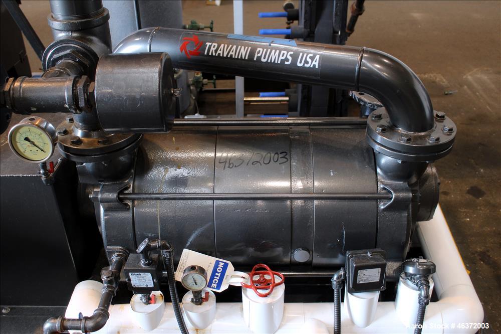 Used Travaini Vacuum System, Model TRW1000H-FR, Carbon Steel. Consisting of Travaini vacuum pump, model TRHE100-1600/X-C/F, serial #AC469-M0PXI, approximately 1000 CFM, 4" inlet/outlet, driven by 100...