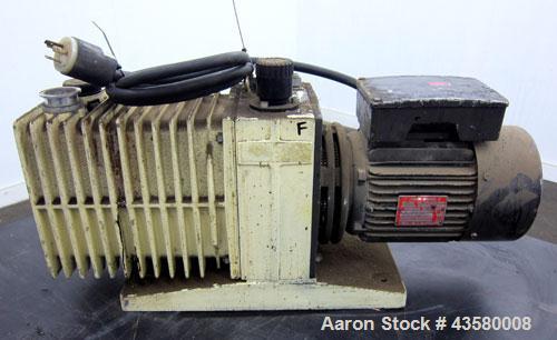 Used Varian Dual Stage Rotary Vane Vacuum Pump, Model SD-700, Part# 0424-P1241-301, Carbon Steel. Approximate 24 cfm. Driven by a 1.5hp, 1/60/115/230 volt, 1735 rpm motor.