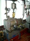 Used Used: Rietschle oil seal vacuum pump. Type VL-100-(03). Approximately 58.86 cfm at 225 torr. Driven by a 5HP 3/60/230/460 volt, 1735 rpm xp motor. Base mounted.