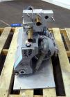 Used Busch Series R5 Single Stage, Oil Sealed, Rotary Vane Vacuum Pump, Model 0100-131, Carbon Steel. Rated 63 cfm, air cooled. Driven by a 3 kw, 220/240 volt, 1440 rpm motor. Base mounted.