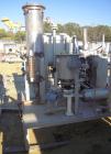 Used Busch Monovac Single Stage Vacuum Pump, Model 216:002. 113 CFM at 40 Torr. Driven by a 10hp,3/60/230/460 volt, 1755 rpm XP motor. Includes  25 gallon C-276 knockout pot, C-276 muffler, carbon st...