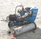 USED: Busch Huckepack two stage rotary vane vacuum pump, model 429, carbon steel. Rated 113 cfm. Radiator cooled with holding tank. 2