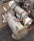 Used Busch Huckepack Two Stage Rotary Vane Vacuum Pump, Model 433:013. Rated 200 cfm at .5 Torr, with a 15 hp, 3/60/460 volt, 1765 rpm XP motor, knock out pot, receiver and heat exchanger. Serial #50...