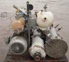 Used Busch Huckepack Two Stage Rotary Vane Vacuum Pump, Model 433:014. Rated 176 cfm at .5 Torr, with a 15 hp, 3/60/460 volt, 1765 rpm XP motor, knock out pot, receiver and heat exchanger. Serial #25...