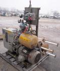 Used Busch Huckepack Two Stage Rotary Vane Vacuum Pump, Model 433:014. Rated 176 cfm at .5 Torr, with a 15 hp, 3/60/460 volt, 1765 rpm XP motor, knock out pot, receiver and heat exchanger. Serial #25...