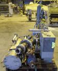 Used Busch Huckepack Two Stage Rotary Vane Vacuum Pump, Model 433:014. Rated 176 cfm at .5 Torr, with a 15 hp, 460 volt motor, knock out pot, receiver and heat exchanger. Serial #25111