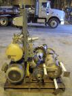 Used Busch Huckepack Two Stage Rotary Vane Vacuum Pump, Model 433:014. Rated 176 cfm at .5 Torr, with a 15 hp, 460 volt motor, knock out pot, receiver and heat exchanger. Serial #25111