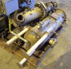 Used Busch Huckepack Two Stage Rotary Vane Vacuum Pump, Model 433:014. Rated 176 cfm at .5 Torr, with a 15 hp, 460 volt motor, knock out pot, receiver and heat exchanger. Serial #25111