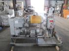 Busch Huckepack Vacuum Pump, Model 437-002. Rated 310 cfm at 0.5 Torr. Driven by 20hp, 230/460 volt XP motor. Skid mounted with silencer, heat exchanger, basket filter, separator and oil pot, serial#...