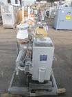 Busch Huckepack Vacuum Pump, Model 437-002. Rated 310 cfm at 0.5 Torr. Driven by 20hp, 230/460 volt XP motor. Skid mounted with silencer, heat exchanger, basket filter, separator and oil pot, serial#...