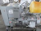 Busch Huckepack Vacuum Pump, Model 437-002. Rated 310 cfm at 0.5 Torr. Driven by 20hp, 230/460 volt XP motor. Skid mounted with silencer, heat exchanger, basket filter, separator and oil pot, serial#...