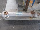 Busch Huckepack Vacuum Pump, Model 437-002. Rated 310 cfm at 0.5 Torr. Driven by 20hp, 230/460 volt XP motor. Skid mounted with silencer, heat exchanger, basket filter, separator and oil pot, serial#...