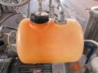 Busch Huckepack Vacuum Pump, Model 437-002. Rated 310 cfm at 0.5 Torr. Driven by 20hp, 230/460 volt XP motor. Skid mounted with silencer, heat exchanger, basket filter, separator and oil pot, serial#...
