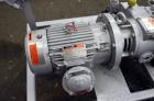 Used Busch Single Stage Cobra Dry Screw Vacuum Pump, Model AC0100, Carbon Steel. Rated 57 cfm, 0.30’’ Torr., direct cooled. Driven by a 5 hp, 3/60/230/460 volt, 3480 rpm XP motor. Mounted on a frame.