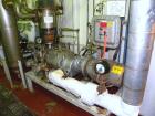 Used Busch Single Stage Cobra Dry Screw Vacuum Pump, Model AC0400FBT6.000H, Carbon Steel. Rated 262 cfm, 0.05’’ Torr., direct cooled. Driven by a 20 hp, 3/60/230/460 volt, 3520 rpm motor. Includes an...