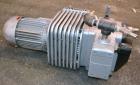 Used Busch Dry Running Rotary Vane Vacuum Pump, Model DC0040B003LCXX, Carbon Steel. Approximate  28 CFM. Driven y a 2.2 kw (3hp), 3/60/230/460 volt, 1704 rpm motor.
