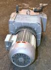 Used Busch Dry Running Rotary Vane Vacuum Pump, Model DC0040B003LCXX, Carbon Steel. Approximate  28 CFM. Driven y a 2.2 kw (3hp), 3/60/230/460 volt, 1704 rpm motor.