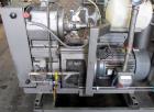 Used- Busch Huckepack Vacuum Pump, Model HO437-D8095. Rated 282 cfm at 0.5 Torr, driven by 20hp, 230/460 volt XP motor. Skid...