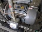 Used Busch Huckepack Vacuum Pump, Model HO437-D8095. Rated 282 cfm at 0.5 Torr, driven by 20hp, 230/460 volt XP motor. Skid mounted with silencer, heat exchanger, basket filter and oil pot, serial# 8...