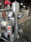 Used Busch Huckepack Vacuum Pump, Model HO437-D8095. Rated 282 cfm at 0.5 Torr, driven by 20hp, 230/460 volt XP motor. Skid mounted with silencer, heat exchanger, basket filter and oil pot, serial# 8...