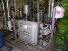 Used Busch Single Stage Cobra Dry Screw Vacuum Pump, model NC0070ABM6.000F, carbon steel. Rated 58 cfm, 0.075 Torr., air cooled. Driven by a 5 hp, 3/20-60/460 volt, 3505 rpm XP motor. Includes an XP ...