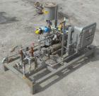 Used Busch Single Stage Cobra Dry Screw Vacuum Pump, model NC0070ABM6.000F, carbon steel. Rated 58 cfm, 0.075’’ Torr., air cooled. Driven by a 5 hp, 3/20-60/460 volt, 3505 rpm XP motor. Includes an X...