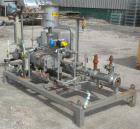 Used Busch Single Stage Cobra Dry Screw Vacuum Pump, model NC0070ABM6.000F, carbon steel. Rated 58 cfm, 0.075’’ Torr., air cooled. Driven by a 5 hp, 3/20-60/460 volt, 3505 rpm XP motor. Includes an X...