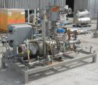 Used Busch Single Stage Cobra Dry Screw Vacuum Pump, model NC0070ABM6.000F, carbon steel. Rated 58 cfm, 0.075’’ Torr., air cooled. Driven by a 5 hp, 3/20-60/460 volt, 3505 rpm XP motor. Includes an X...
