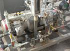 Used Busch Single Stage Cobra Dry Screw Vacuum Pump, Model NC0070ABM6.000F, Carbon Steel. Rated 58 CFM, 0.075’’ Torr., air cooled. Driven by a 5 HP, 3/20-60/460 Volt, 3505 RPM XP motor. Includes an X...