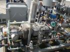 Used Busch Single Stage Cobra Dry Screw Vacuum Pump, Model NC0070ABM6.000F, Carbon Steel. Rated 58 cfm, 0.075’’ Torr., air cooled. Driven by a 5 hp, 3/20-60/460 volt, 3505 rpm XP motor. Includes an X...