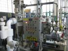Used- Busch vacuum pump system, Model NC0250 ABM6.000F, with RAS steel condenser, installed 2010